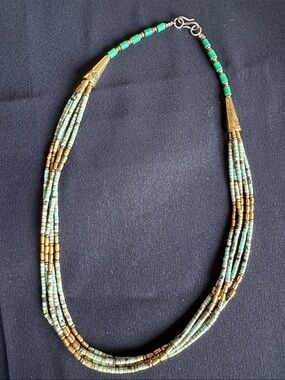 Wooden & acrylic EUC five-strand beaded necklace. Goldtone spacers & caps